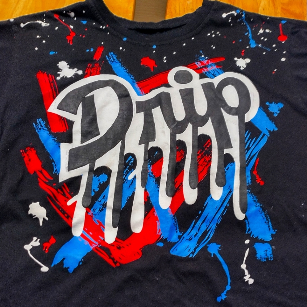 Black print on drip shirt